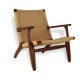 Replica of the Nordic Lounge CH25 armchair in walnut wood