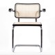 Replica of the Cesca Chair with armrests by designer Marcel Breuer